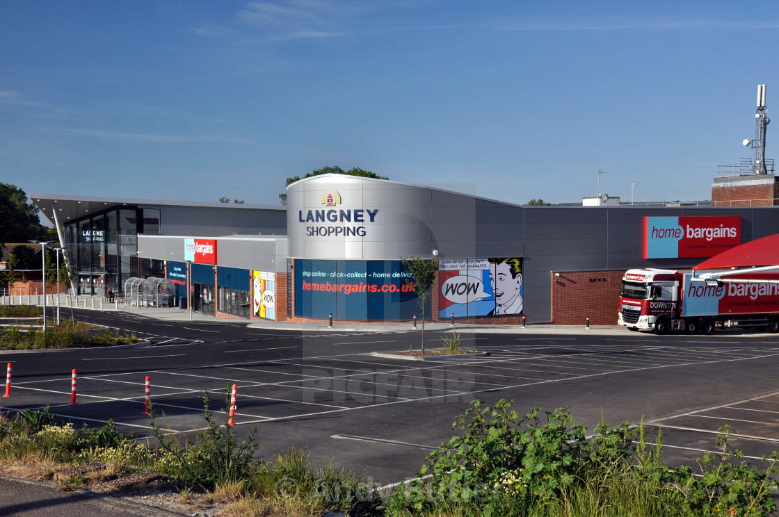 shopping centre on a sunny morning with home bargains delivery truck. Langney Shopping Centre